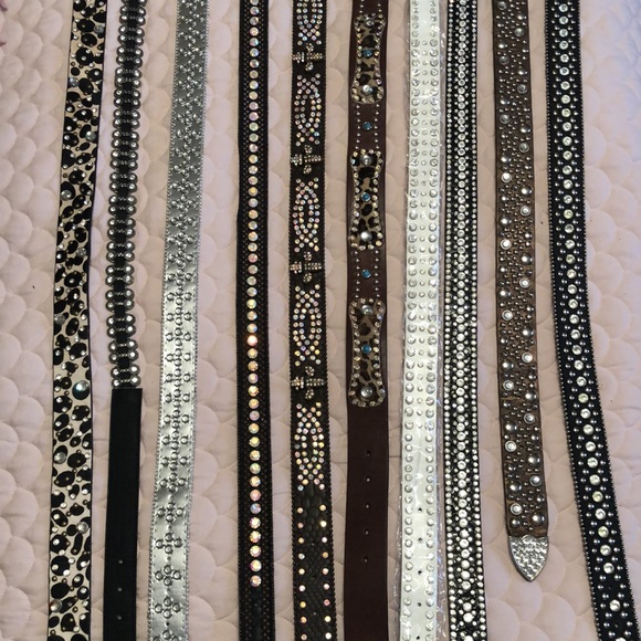 10 bling fashion belts - never worn Paid $25 - 44.